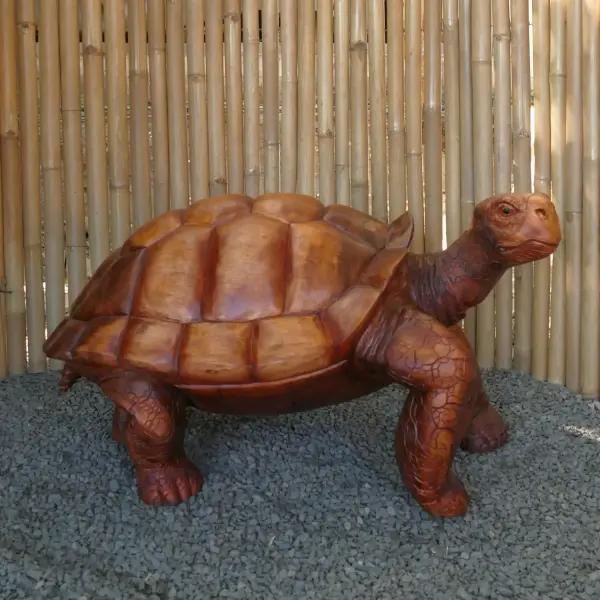 Product image of the product “Turtle, carved from Suar Wood. In the sizes from 80 to 100cm. ”